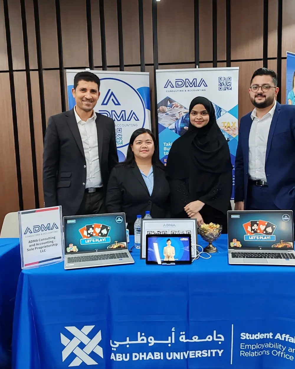 The ADMA team at their stand, Abu Dhabi University career fair