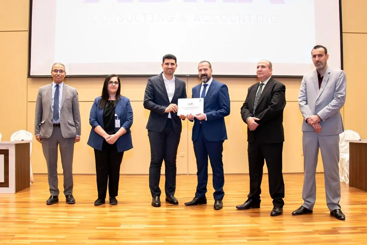 ADMA on stage at a university event