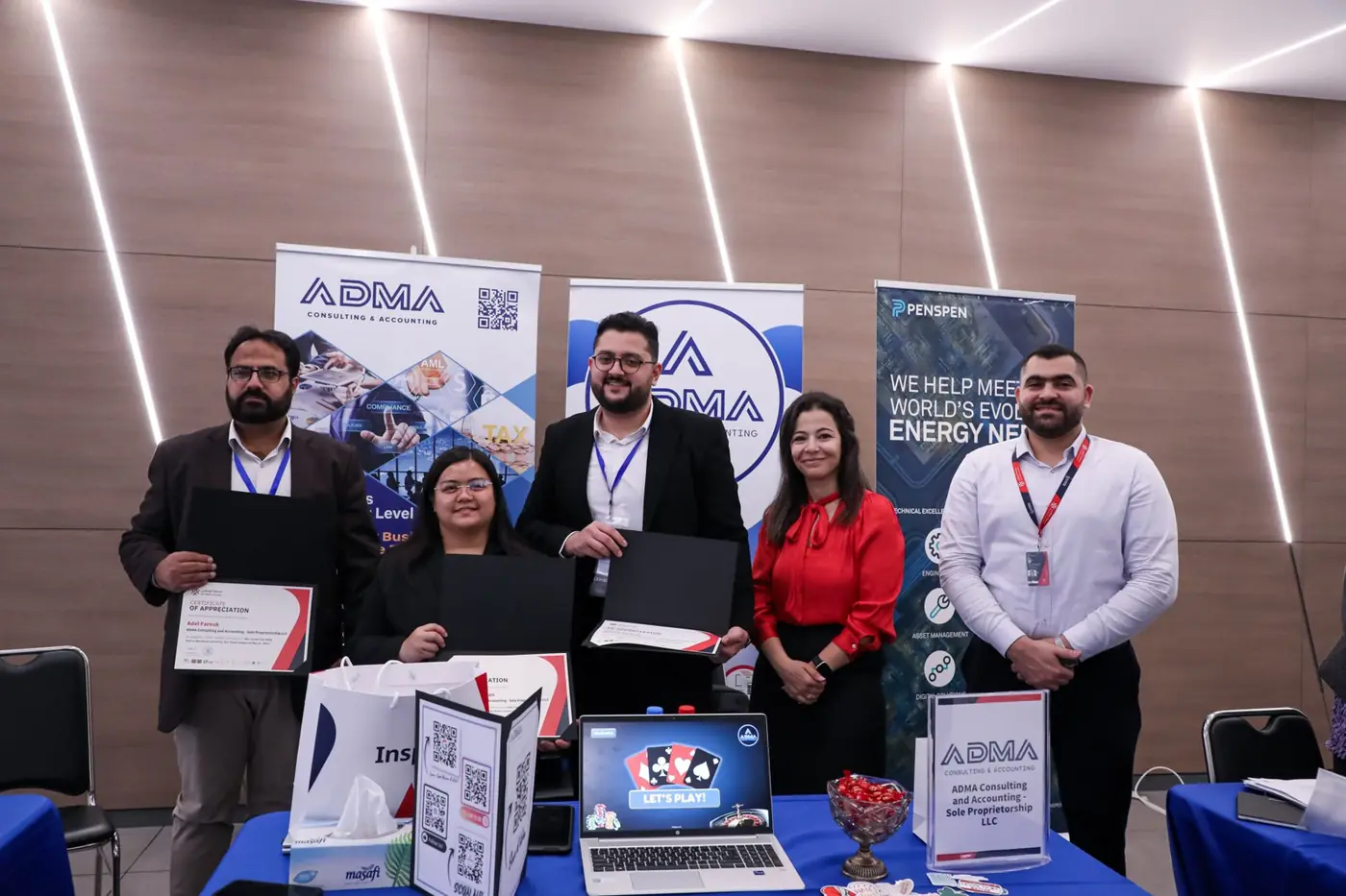 ADMA team members at their career fair stand